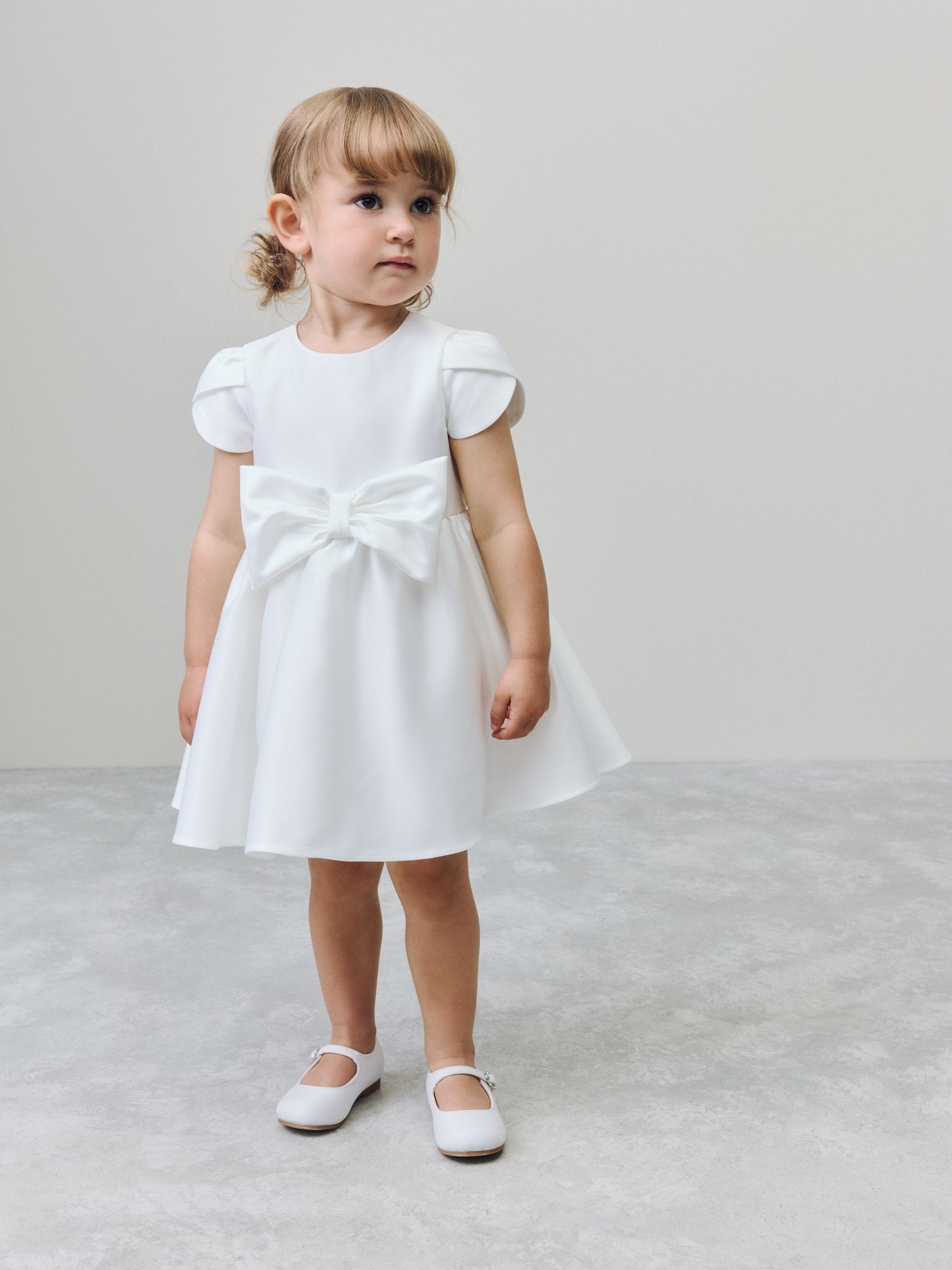 Ivory Girls Flower Bow Front Dress (3mths-10yrs)