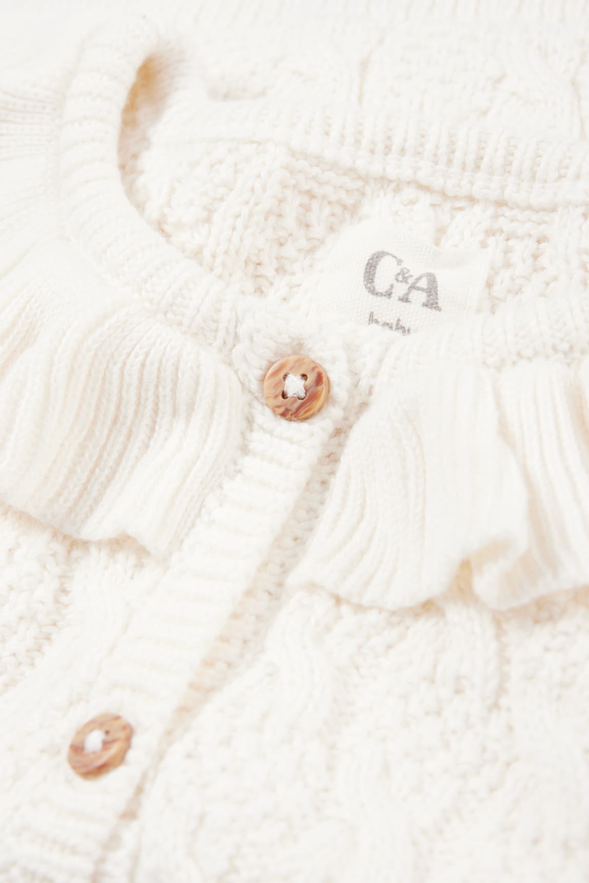 Baby cardigan - cable knit pattern