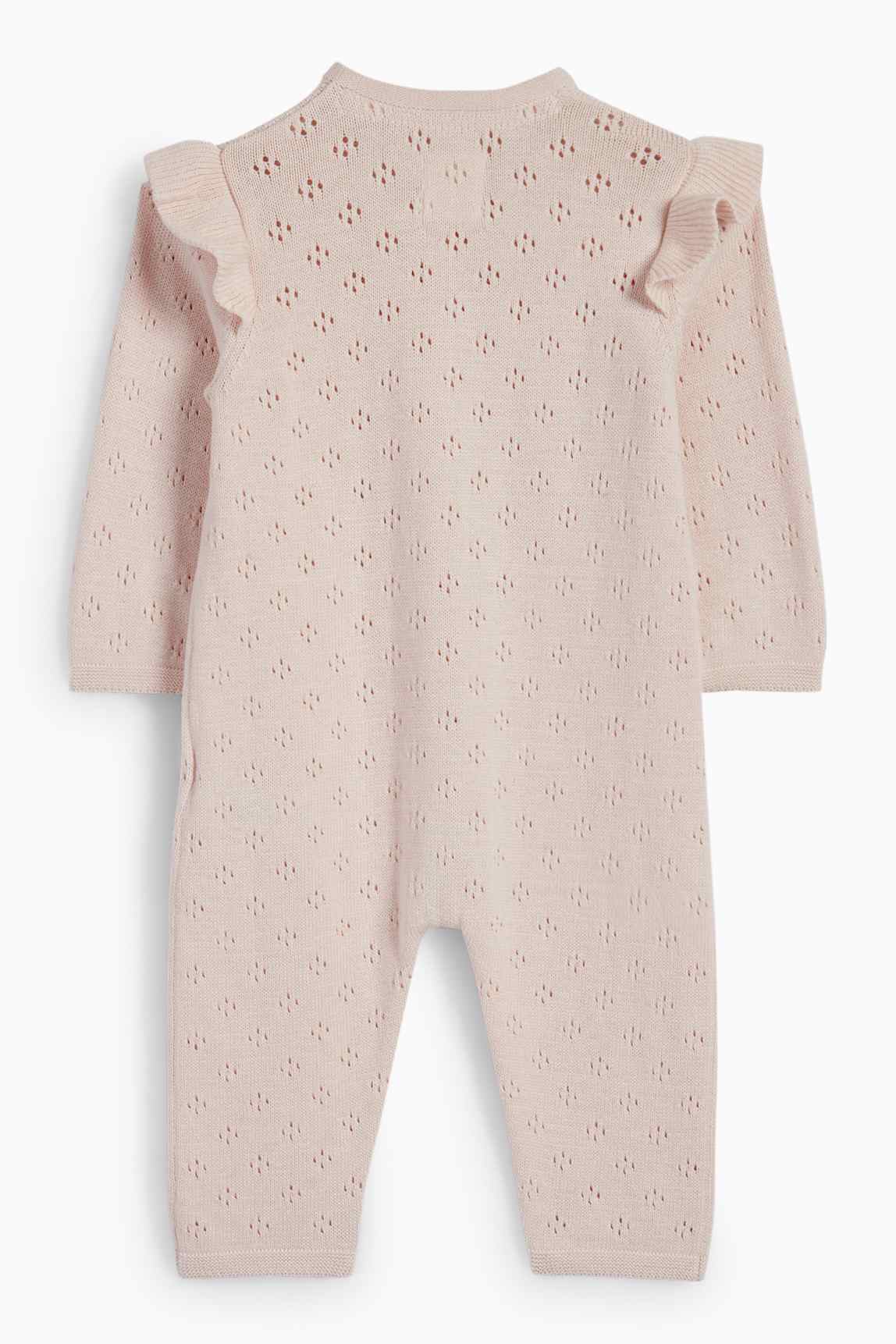 Knitted baby jumpsuit