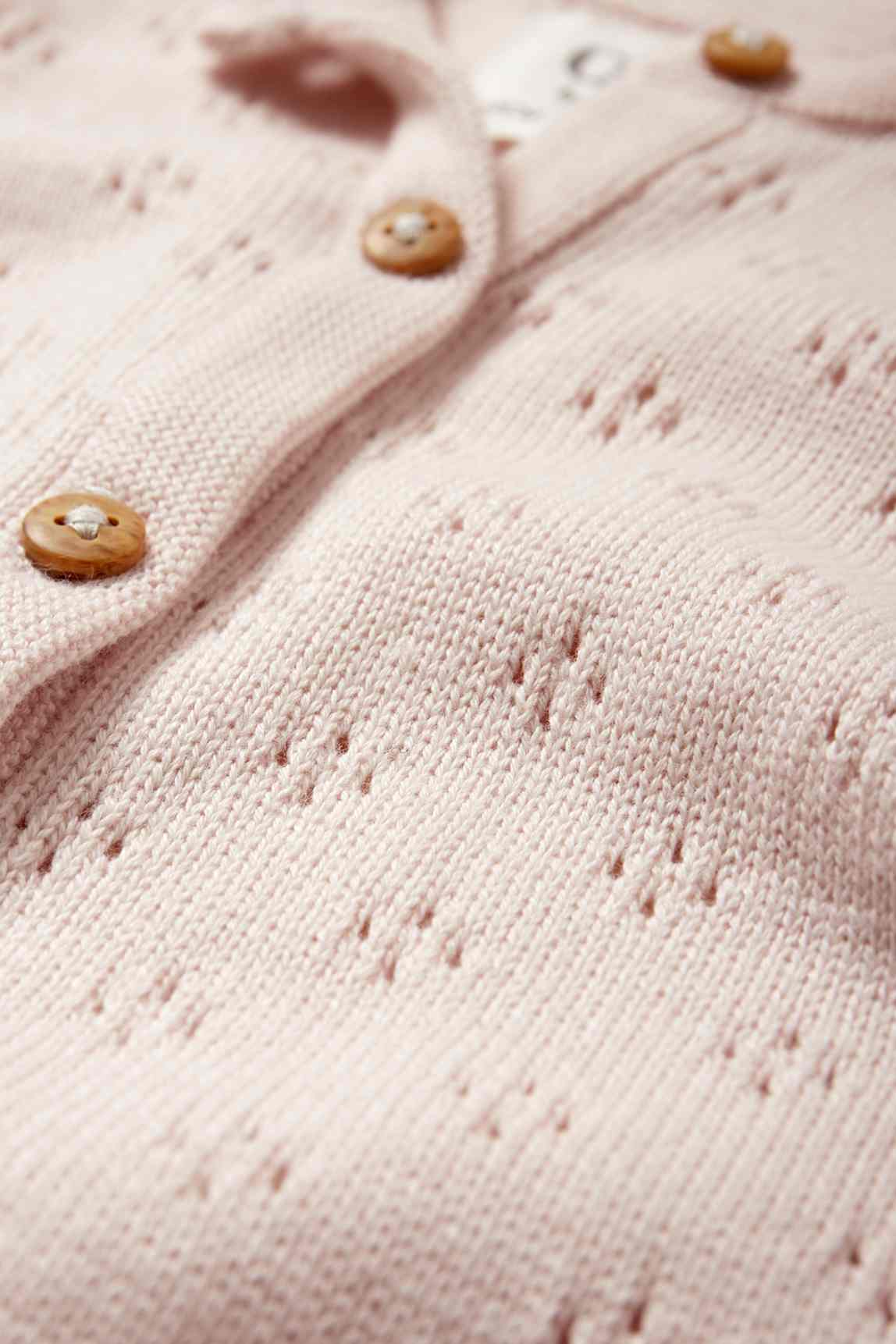 Knitted baby jumpsuit