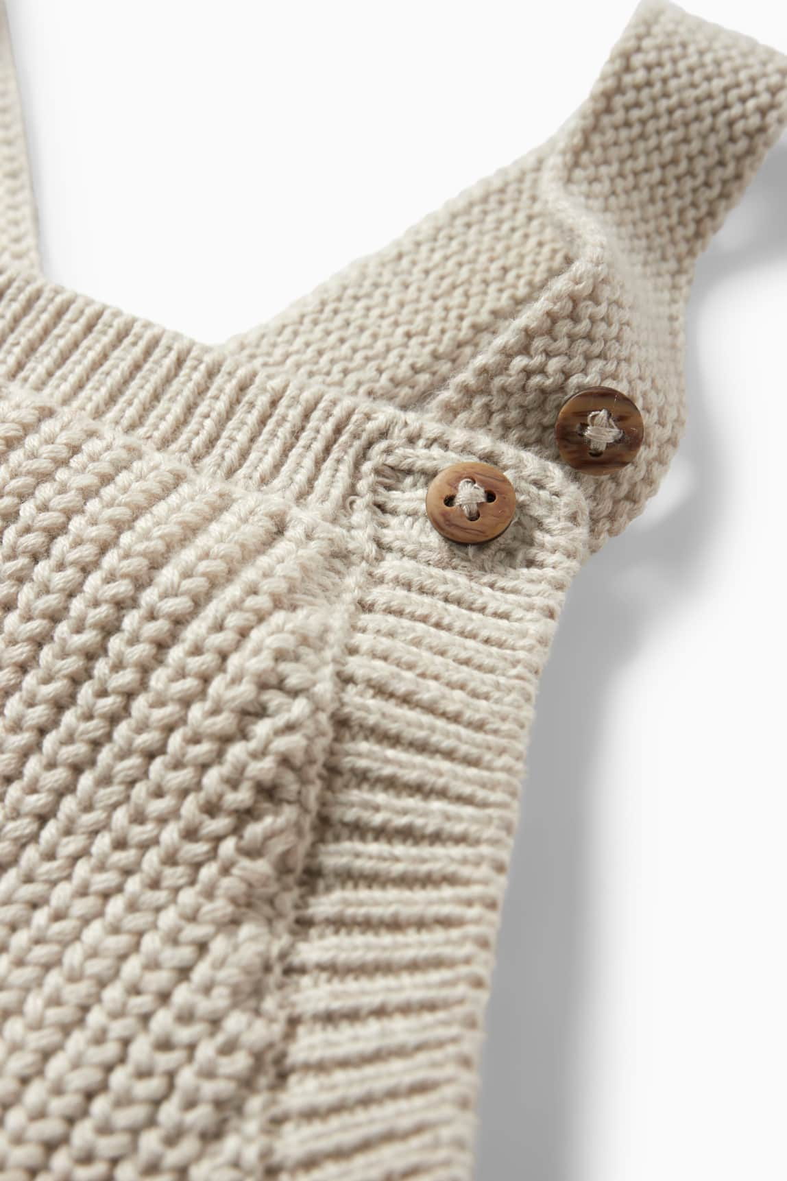 Knitted baby dungarees